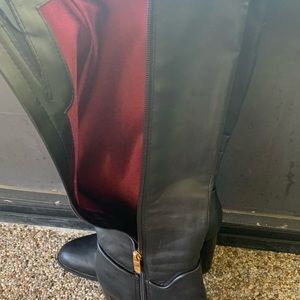 Tall black leather boots